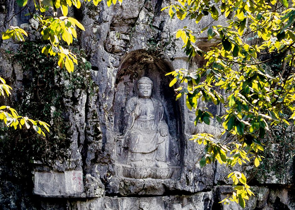 Ancient stone Buddha carvings at Feilai Feng near Lingyin Temple