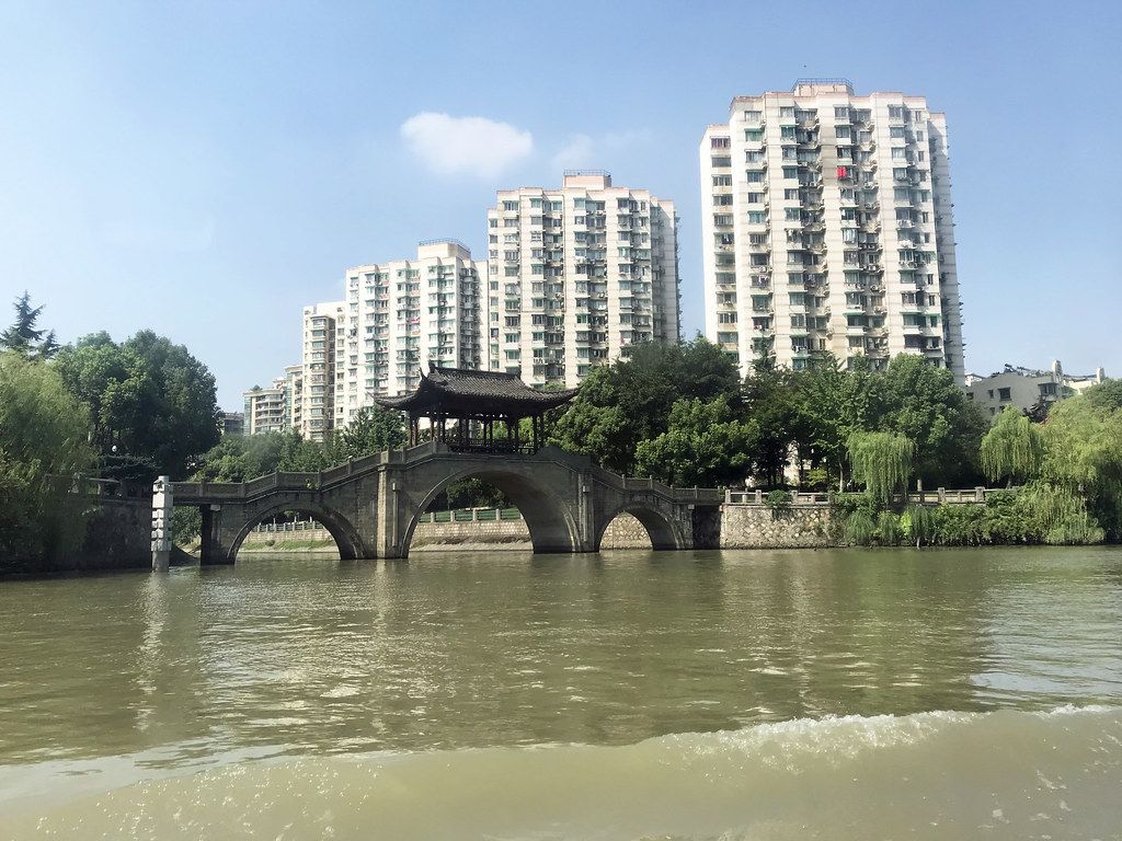 Stone Gongchen Bridge and old houses along Hangzhou's Grand Canal