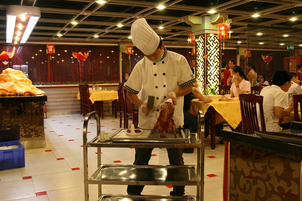 Crispy Peking duck with pancakes and scallions