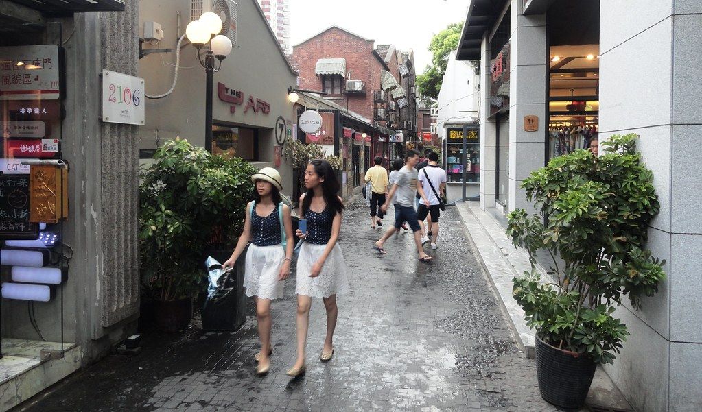 Shanghai French Concession street with cafes and bicycles