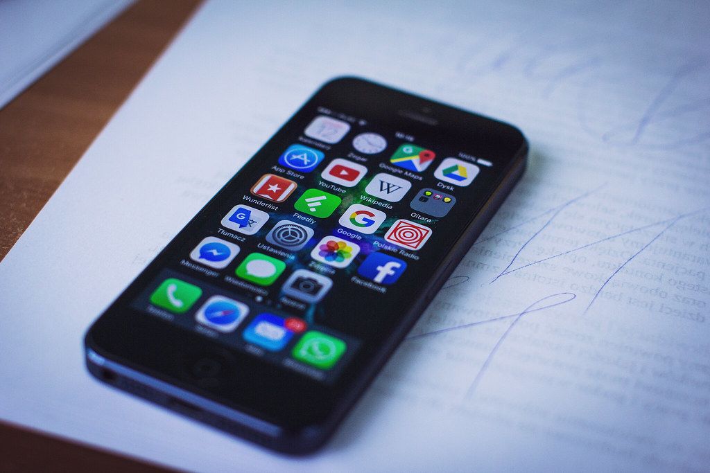 A smartphone home screen full of mobile apps