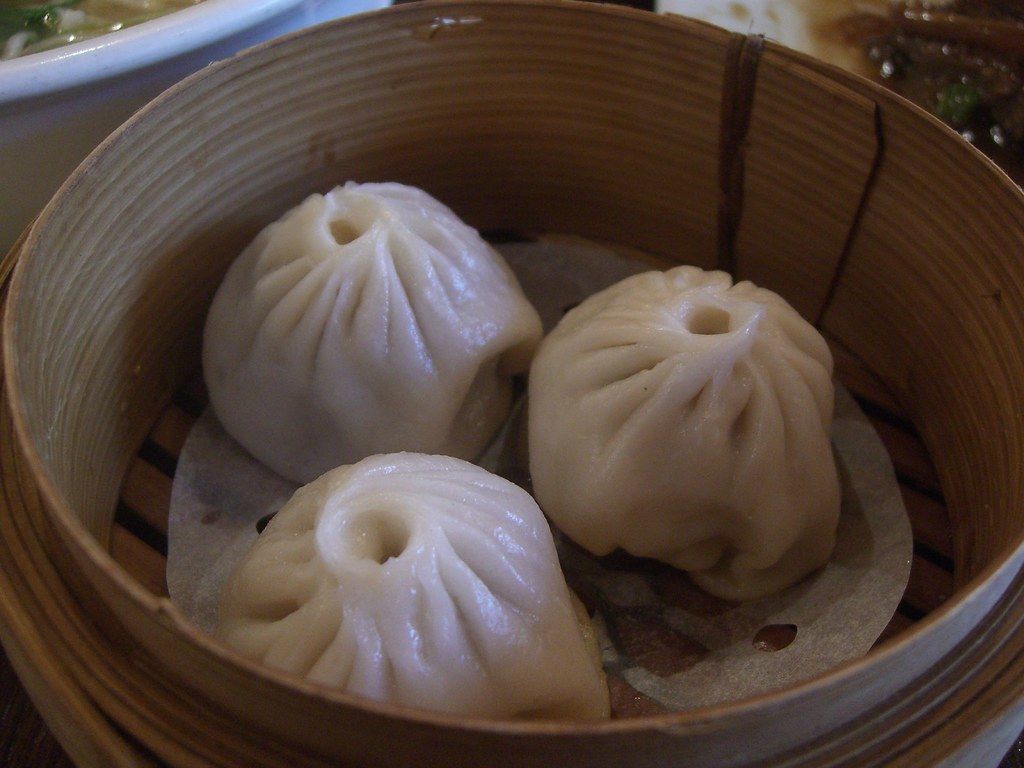 Xiaolongbao soup dumplings with ginger and vinegar